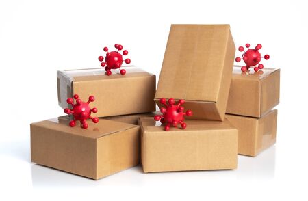 Coronavirus outbreak in 2019,Flu COVID-19 virus cell with cardboard boxes for delivery or moving isolated on whiteの写真素材