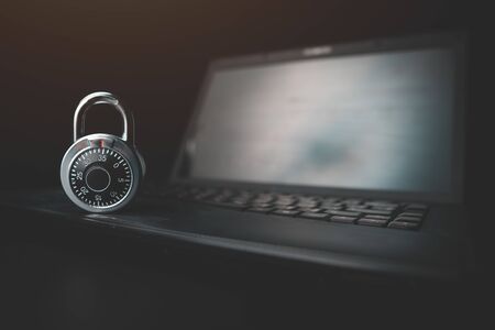 Cyber safety concept,Combination Lock with laptop computer,Protection of private personal data. A...