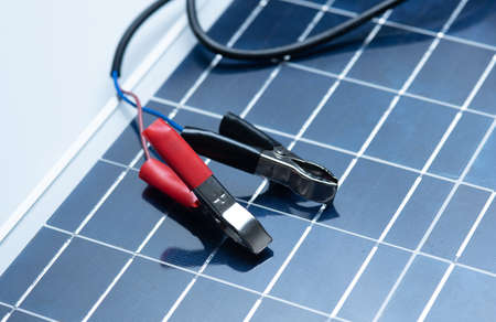 Blue solar panel with battery clampsの写真素材