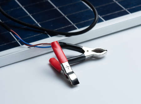 Blue solar panel with battery clampsの写真素材