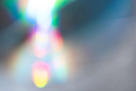 Blurred rainbow light refraction from the surface of a DVD,Prism Rainbow Light Flaresの写真素材
