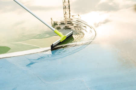 Removes dirt and water from concrete sport field or soccer pitch outdoor
