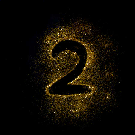 Letters of golden glitter sparkle on black backgroundの写真素材