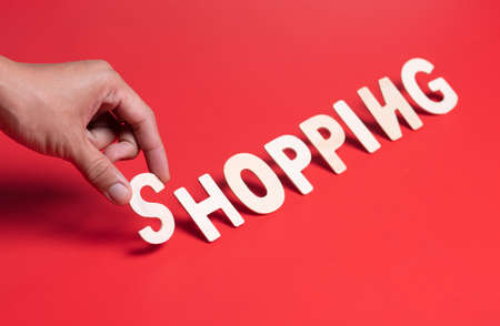 Letters "SHOPPING"on blue background,Business and online shopping conceptの写真素材