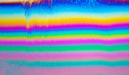 Surreal patterns with rainbows and waves of color in motion of a soap bubble,colorful patternsの写真素材