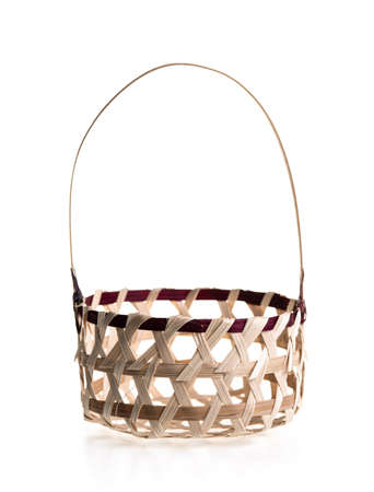 Brownâ bambooâ basketâ isolatedâ onâ whiteâ background.の写真素材