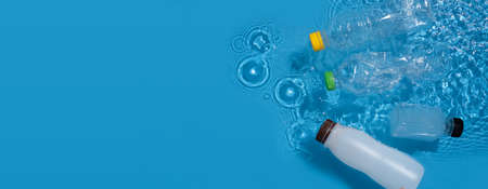 Dirty river with bottle and plastic ,Freshwater pollution concept,top view