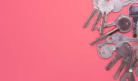 Collection of silver key on pink backgroundの写真素材