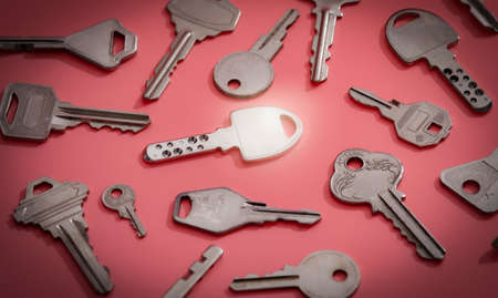 Collection of silver key on pink backgroundの写真素材