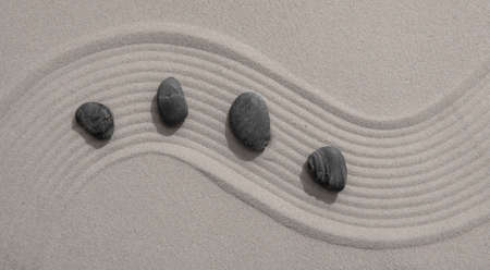 Zen garden japanese garden zen stone with zen pattern in sand as background