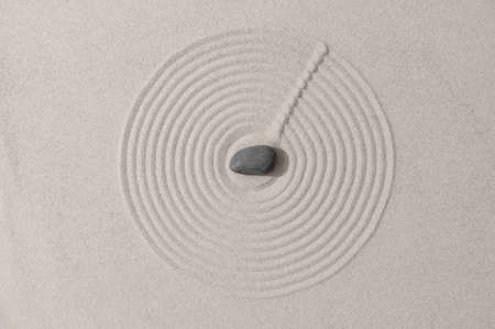 Zen garden japanese garden zen stone with zen pattern in sand as background