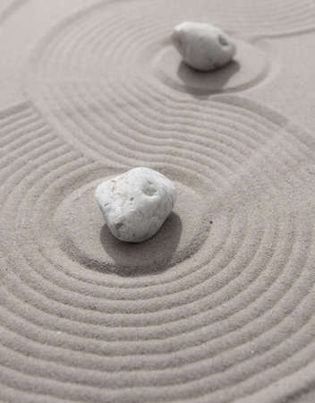 Zen garden japanese garden zen stone with zen pattern in sand as background