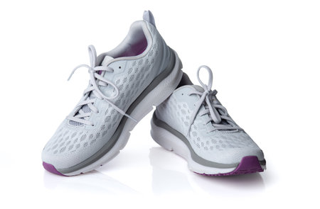 Gray sport running shoes isolated on white backgroundの写真素材
