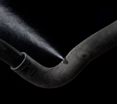 Old rubber hose straps,water or gas leak form rubber tube or holeの写真素材