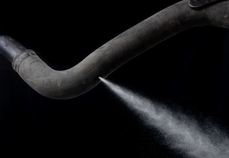 Old rubber hose straps,water or gas leak form rubber tube or holeの写真素材