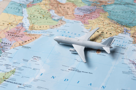 Air travel concept.airplane with touristic mapの写真素材