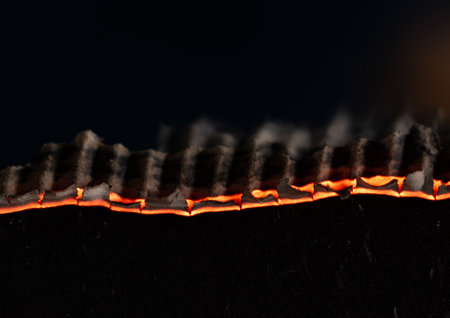 Burning paper on black background,Burnt paper edges.