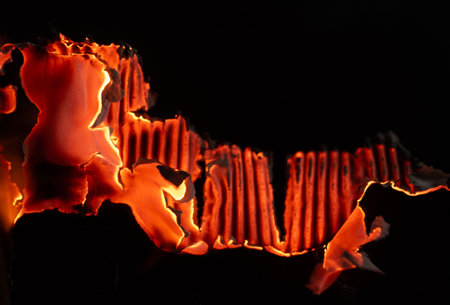 Burning paper on black background,Burnt paper edges.