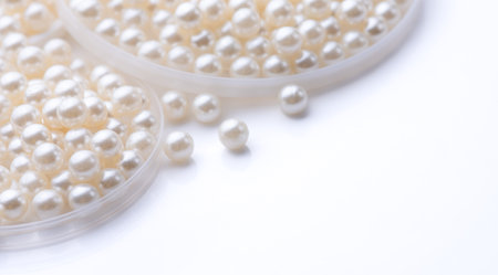 Pile of pearls on the white backgroundの写真素材
