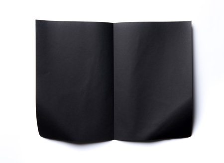 Black paper poster texture isolated on white backgroundの写真素材