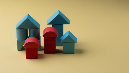 Wood House Model on yellow background and free copy space for your text.の写真素材