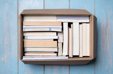 Dispose of old books box,Cardboard box full of old books, bird's-eye viewの写真素材