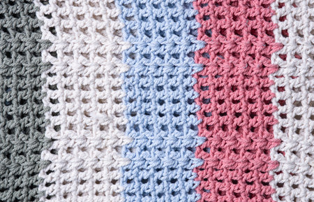 Cable knitting stitch pattern, soft woolen texture, handmade knitted clothの写真素材