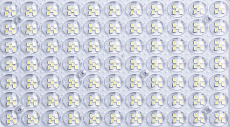 White LED panel with yellow light on background, top view, close upの写真素材