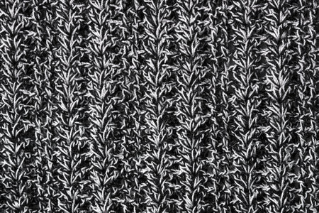 Cable knitting stitch pattern, soft woolen texture, handmade knitted clothの写真素材