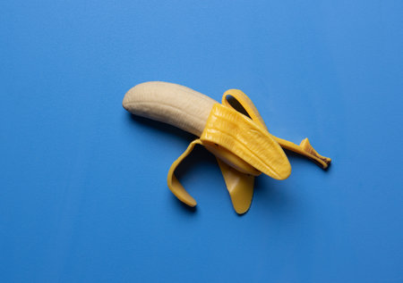 Ripe bananas on blue backgroundの写真素材