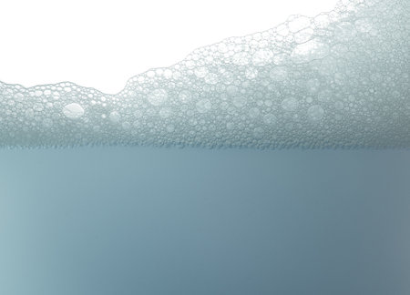Soap foam surface,soap bubbles against white backgroundの写真素材