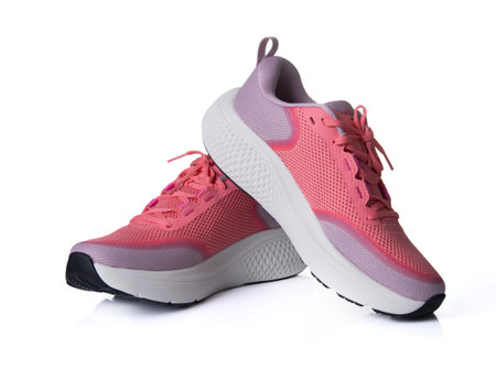 Pink sport shoes isolated on white background.の写真素材