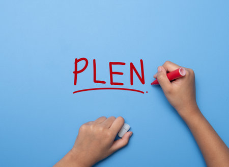 Hand writing PLEN with marker, concept backgroundの写真素材