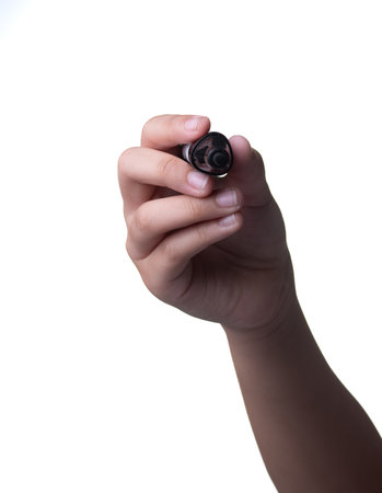 Hand holding black marker for writing isolated on white backgroundの写真素材