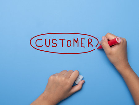 Hand writing CUSTOMER with marker, concept backgroundの写真素材