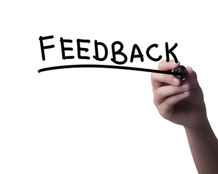 Hand writing FEEDBACK with marker, concept backgroundの写真素材