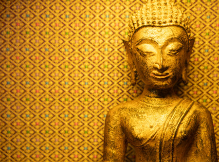 Golden Buddha Statue in Thai Templeの写真素材