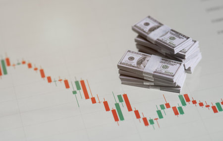 Banknotes over digital screen with real life exchange chart, USD EUR parity concept, Concept of...