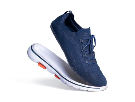 Women's sports shoes beige sneakers side viewの写真素材