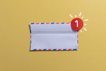 White envelope with notification red dot.の写真素材
