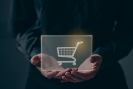 Ecommerce online shop concept, Add to cart internet web store buy online, Business man using smartphone with shopping, sale, retail, cart and business service technologyの写真素材