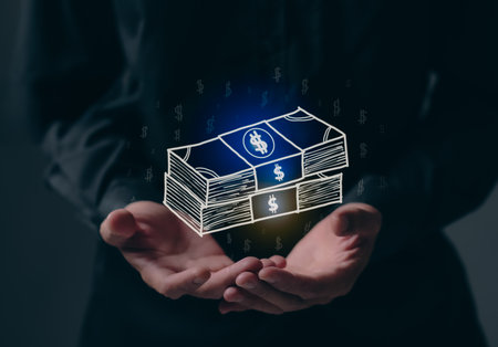 Businessman drawing banknotes stack and idea for making moneyの写真素材