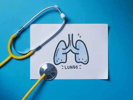 Doctor's Stethoscope Checking with lungs on blue background,Medical Concept,checkup all organsの写真素材