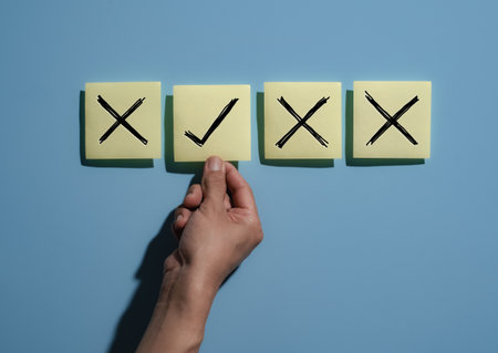 Sticky Notes on Board,Businessman is thinking and making choices right from wrong symbols. Decide to...