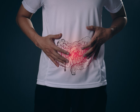 Man Clutching Abdomen with Red Glowing Intestine Pain Illustration