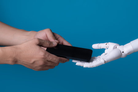 The Digital Transfer: Human and Robot Exchange a Smartphone