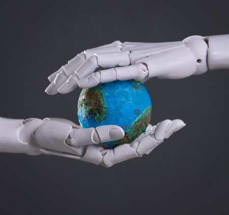 The Future's Care: Robotic Hands Cradle the Earthの写真素材