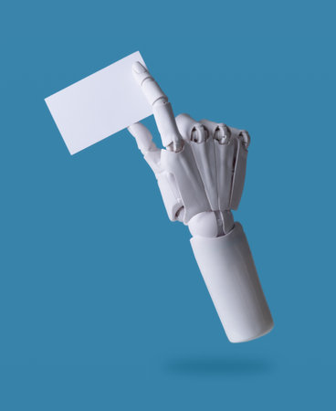 The AI Connection: Robotic Hand Presenting a Blank Business Cardの写真素材