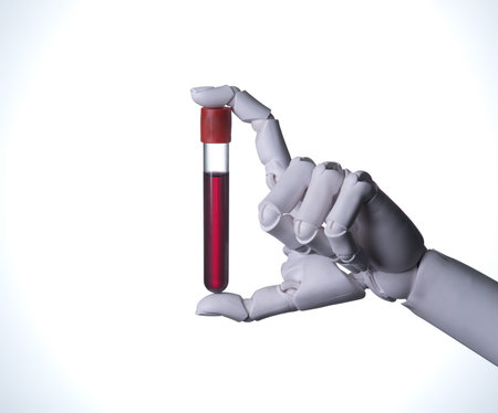 Robot Hand Holding a Blood Test Tube for Laboratory Analysisの写真素材
