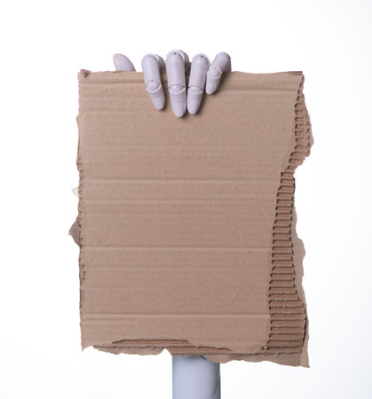 AI Robot Hands Holding Empty Cardboard Sign for Your Text or Messageの写真素材